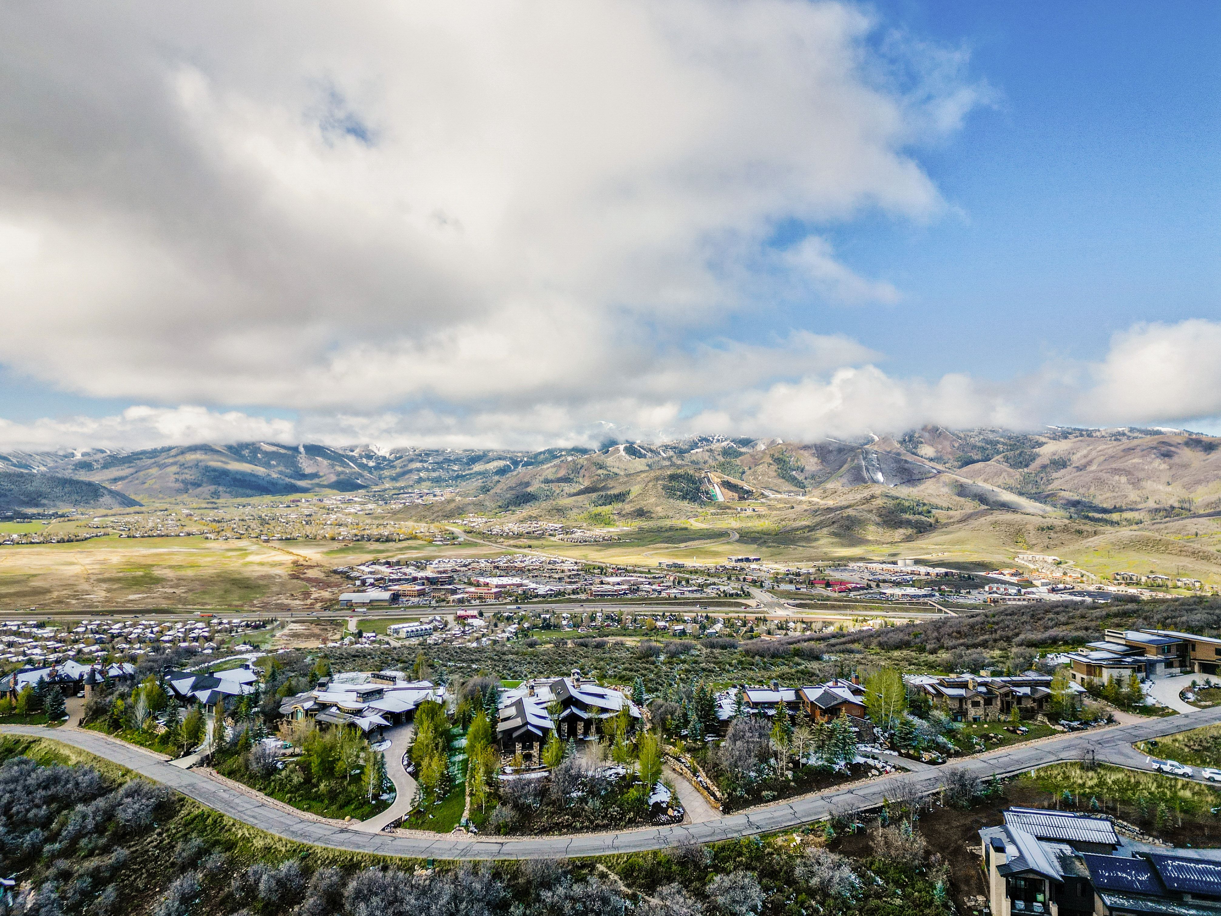 Expansive mountain landscape with scattered residential properties