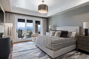Tray ceiling with shiplap panels and recessed lighting