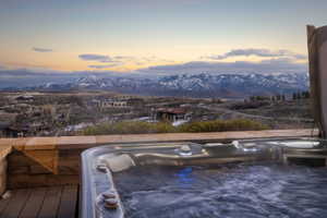 Outdoor spa with mountain backdrop