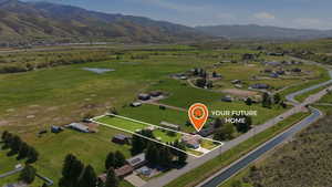 Expansive property featuring a single-story residence and a verdant lot