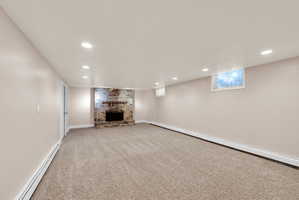 Basement family room with wood fireplaces