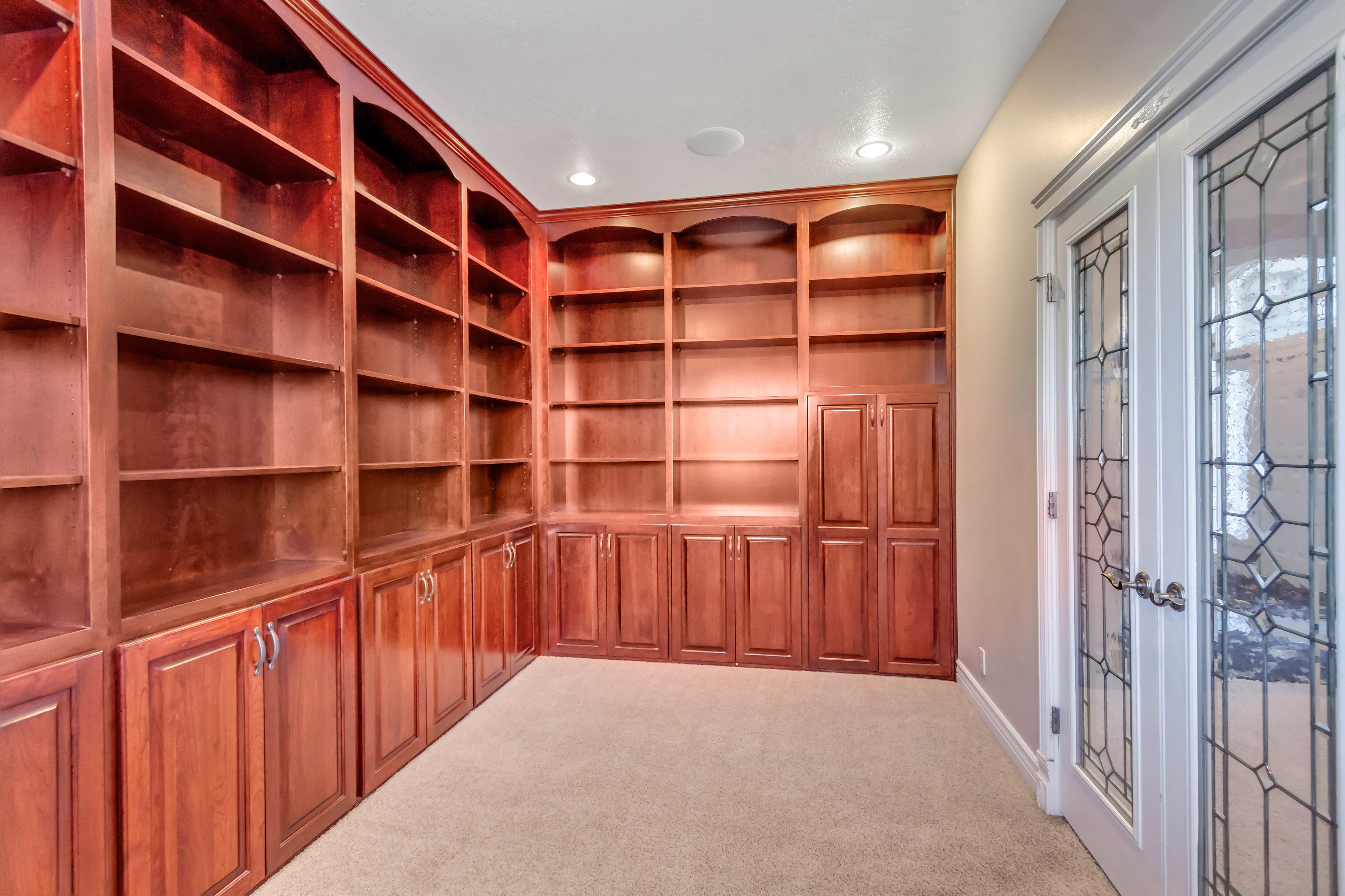 Built-in wood-finish shelving and cabinetry