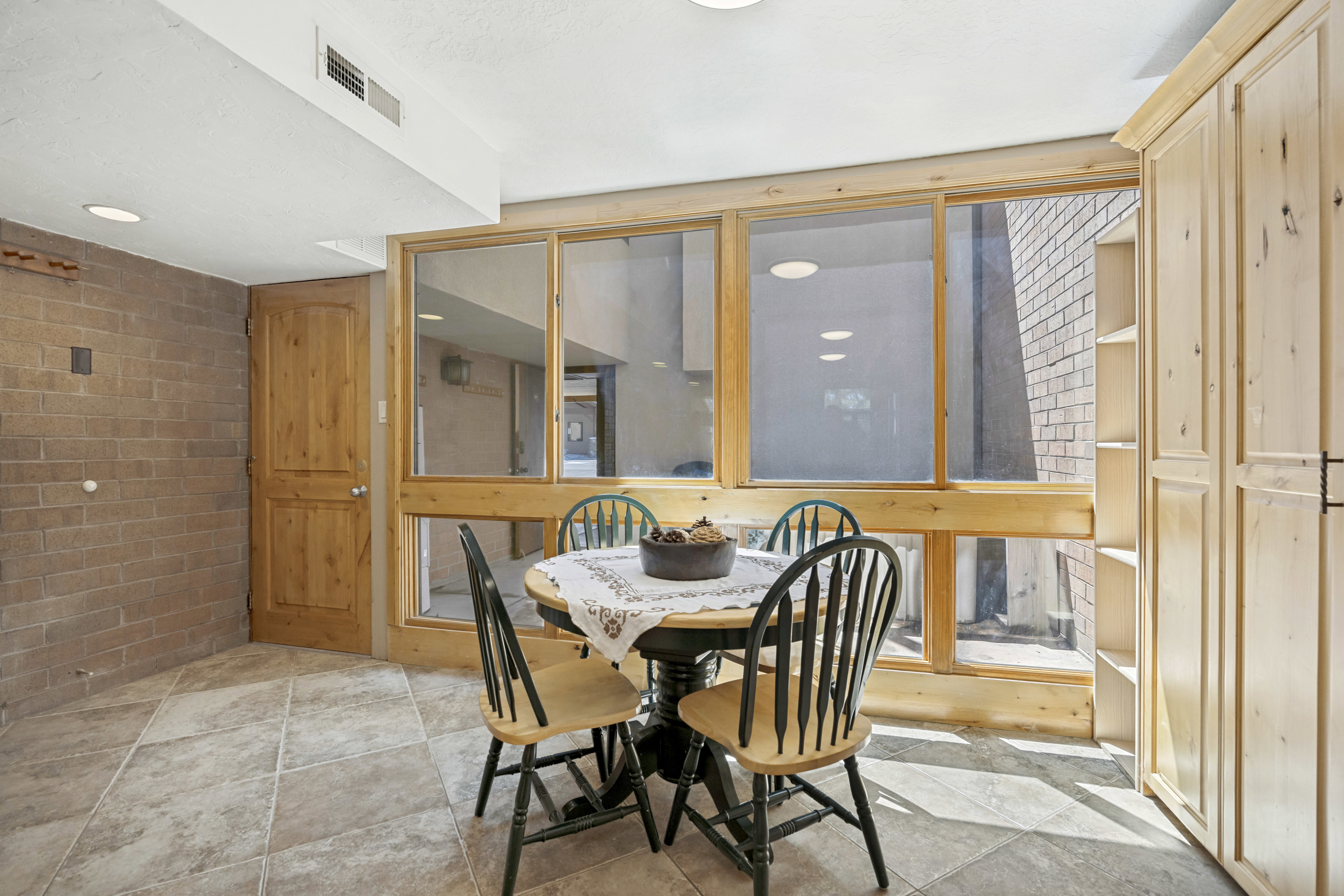 Bright dining area.  Updated windows throughout unit