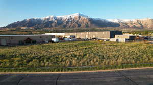 Street-level view of the 1.38-acre Pleasant View commercial ground lease parcel, surrounded by established business/industrial uses and positioned near the growing 2700 North corridor.