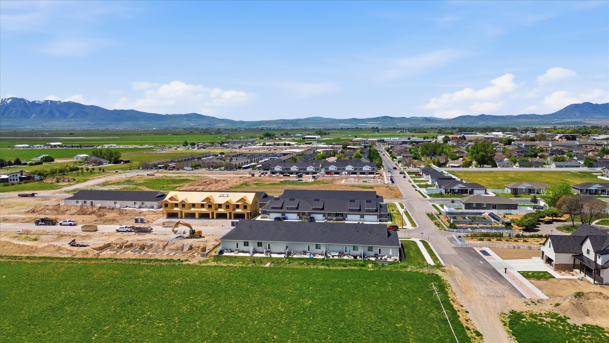 Developing residential area featuring single-family homes and multi-unit structures