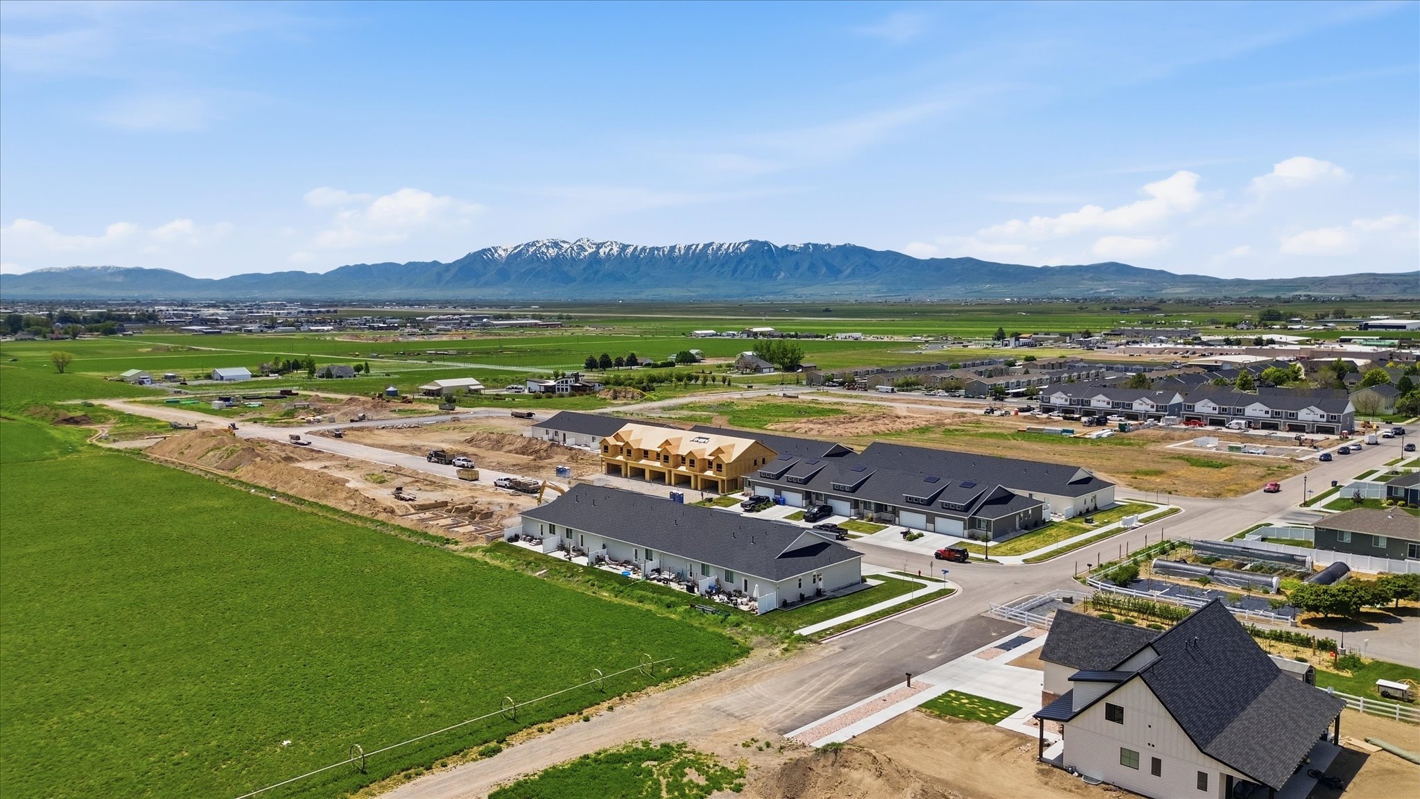 Panoramic aerial perspective showcasing a developing residential area with new construction