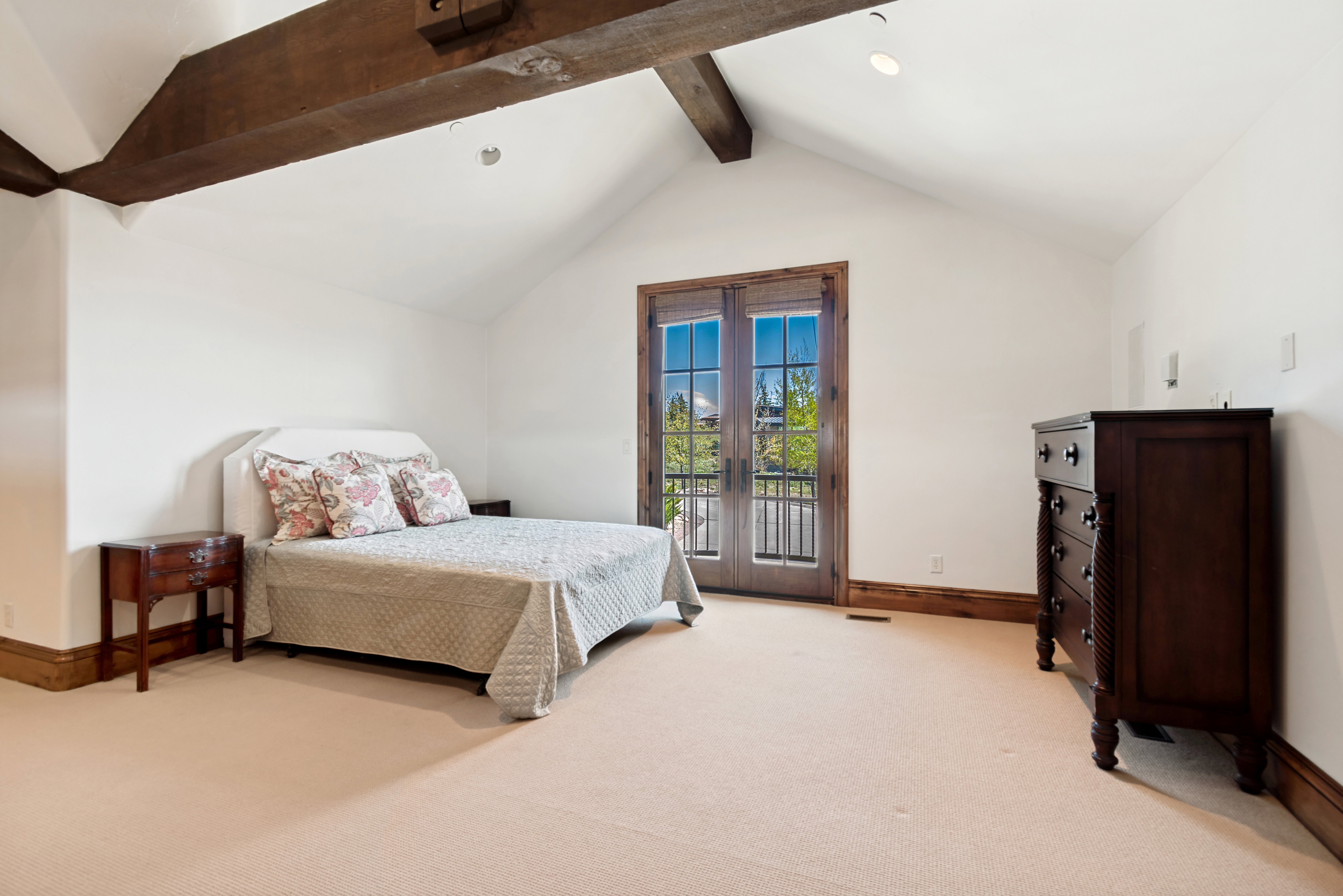 Vaulted ceiling with exposed wood beams