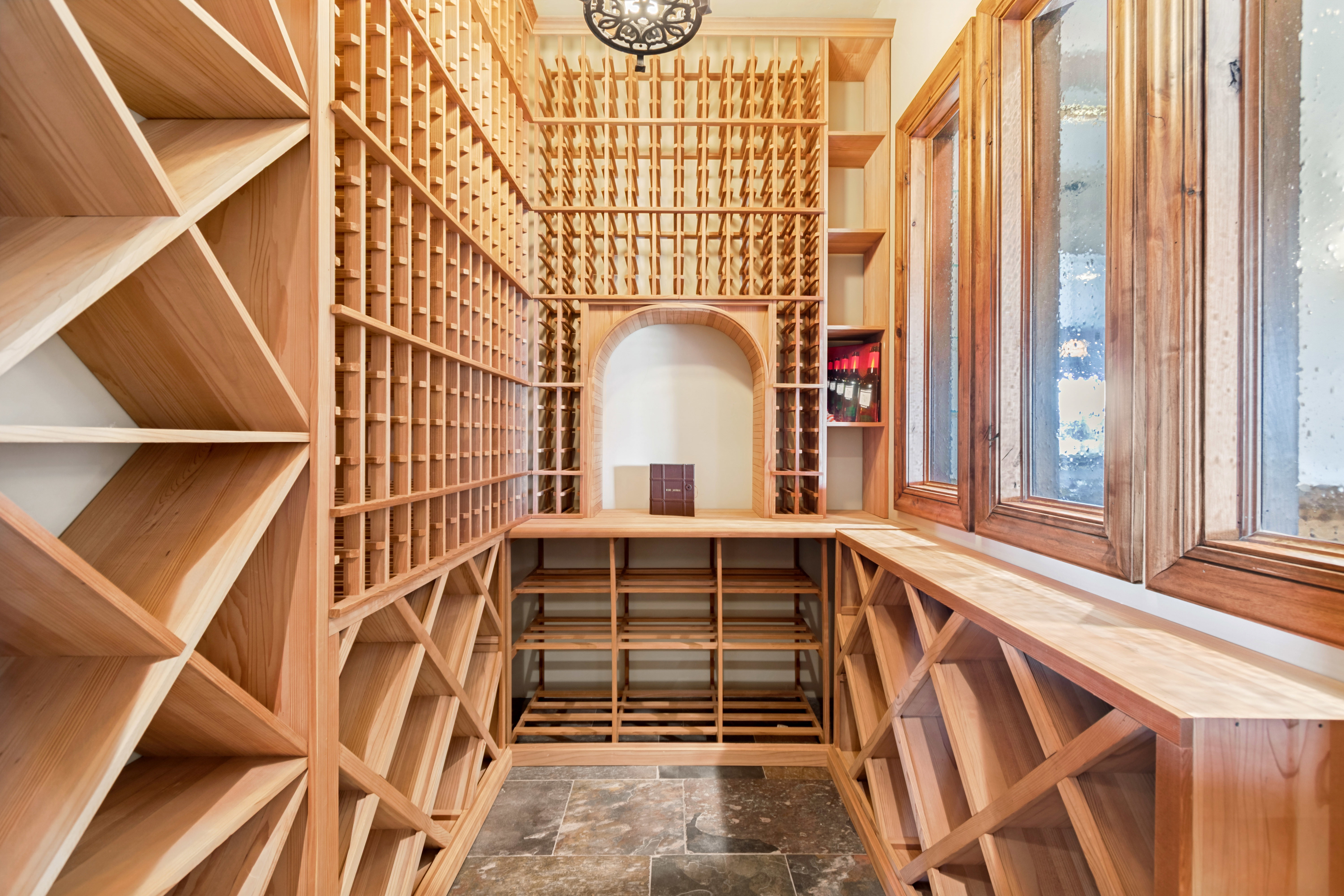 Custom-built wine cellar featuring extensive light wood racking