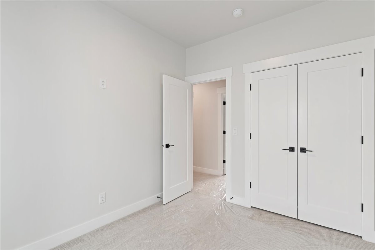 Neutral wall finishes with crisp white trim