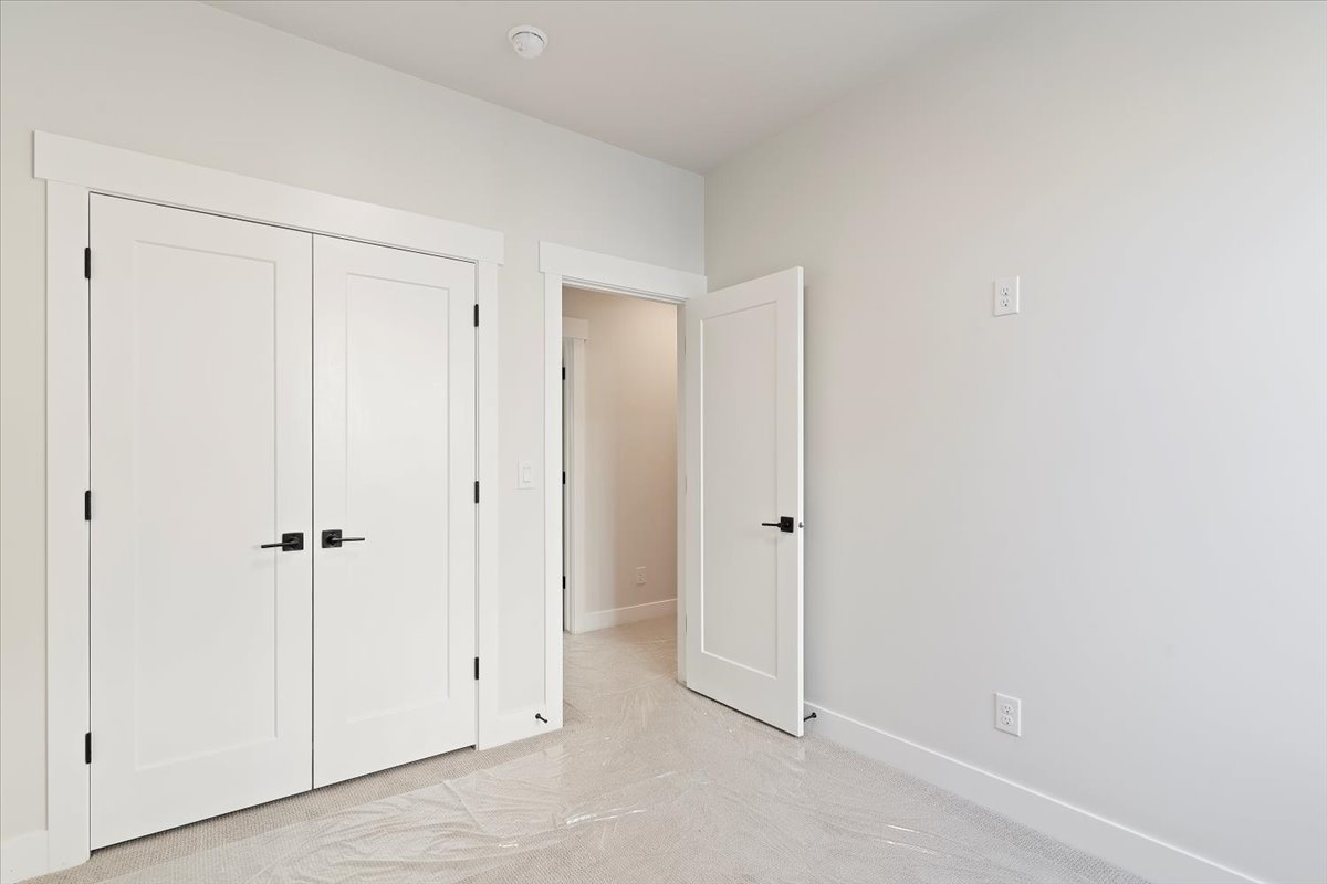 Double panel doors with contemporary matte black hardware