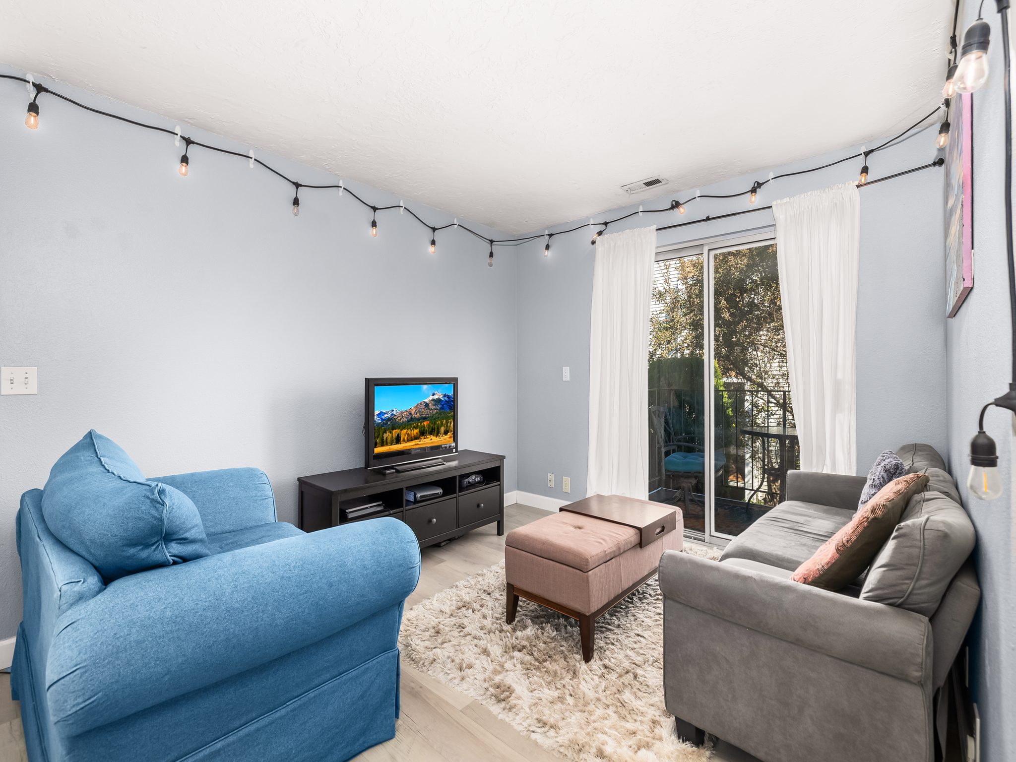 Light blue wall color with white trim