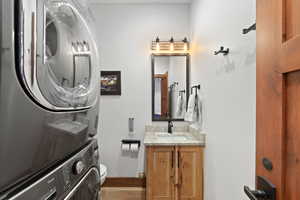 Compact laundry area with stacked washer and dryer