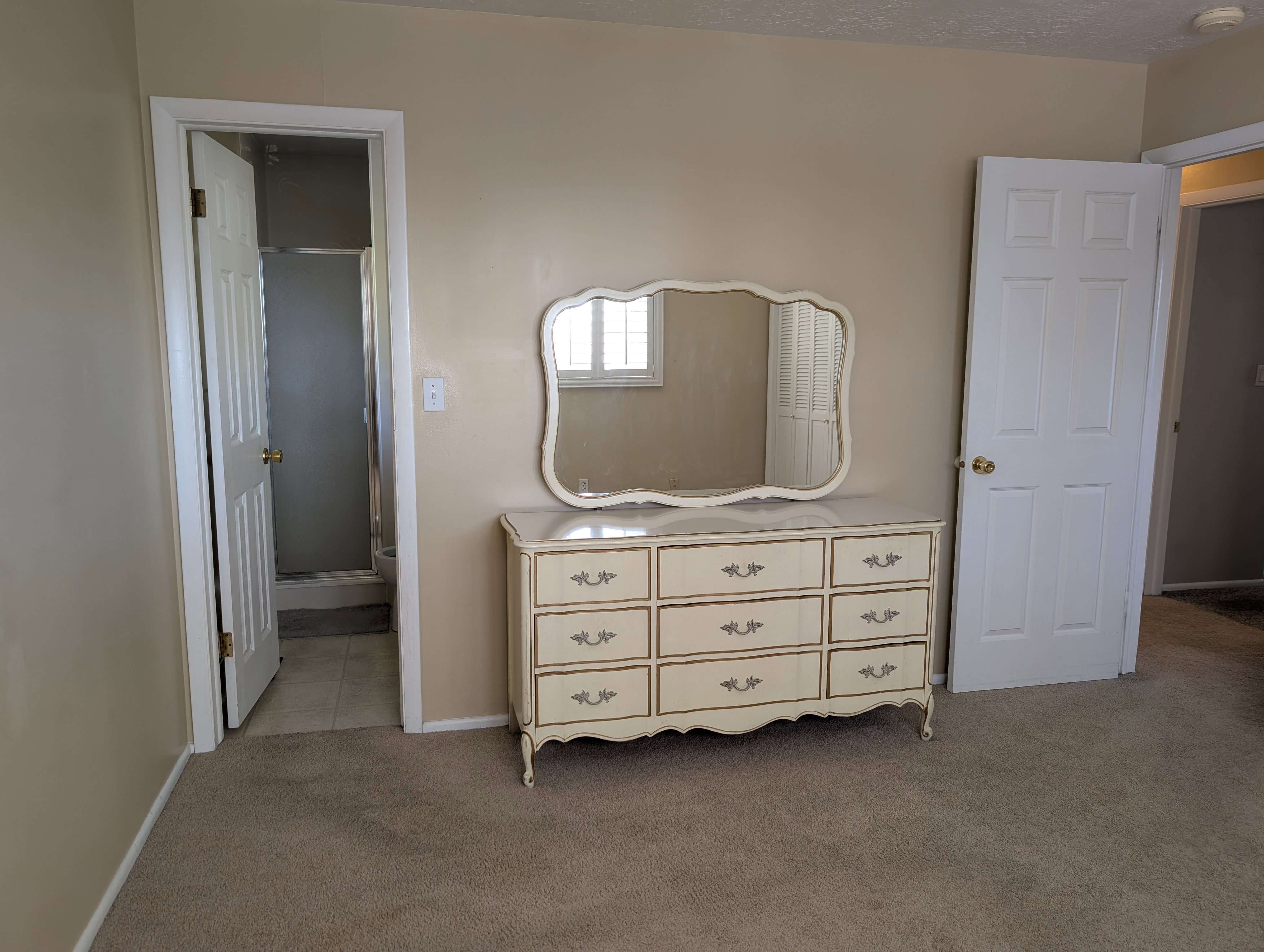 Master bedroom with adjoining master bathroom