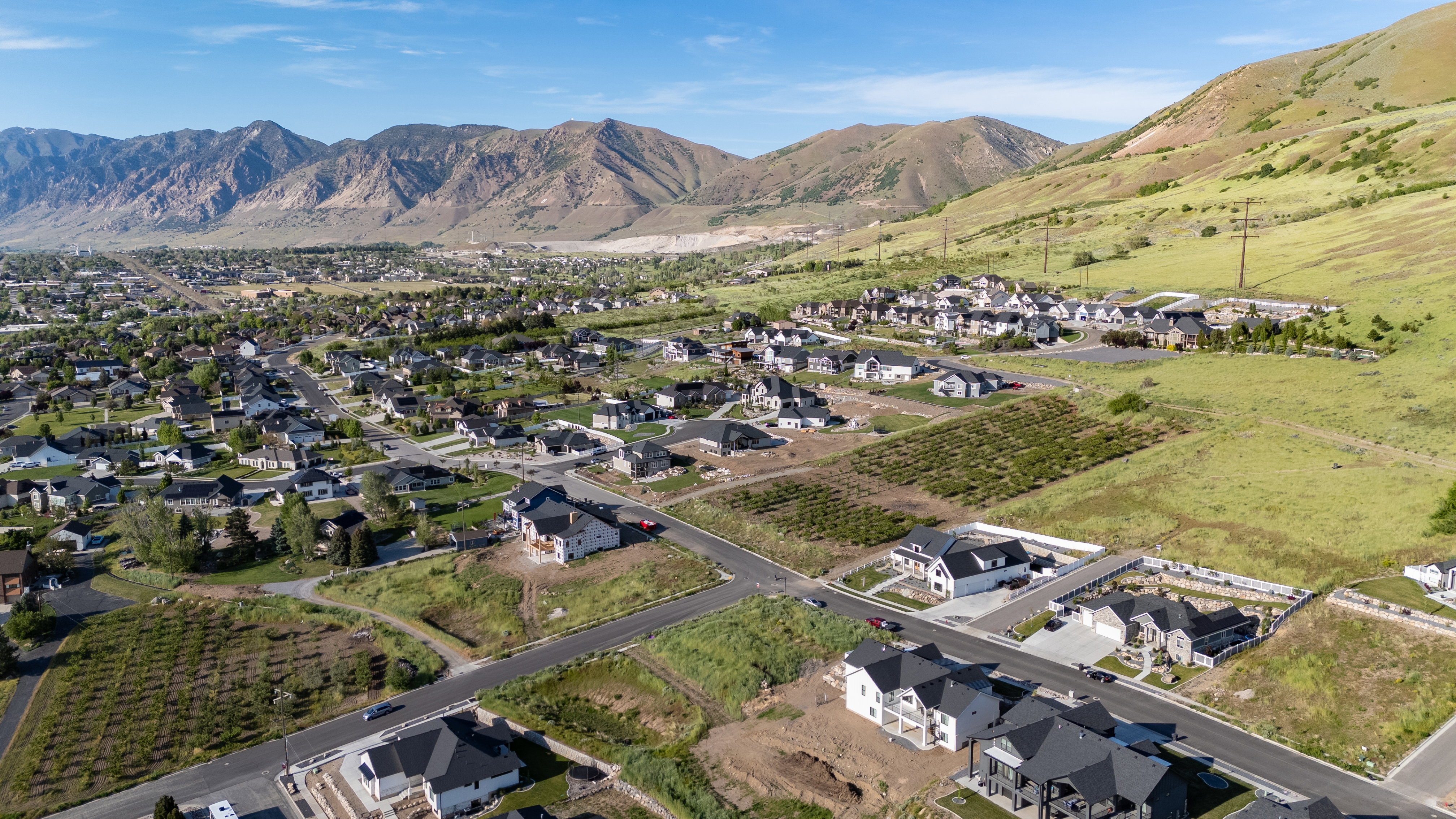 Expansive residential development featuring modern residences and mountain backdrops