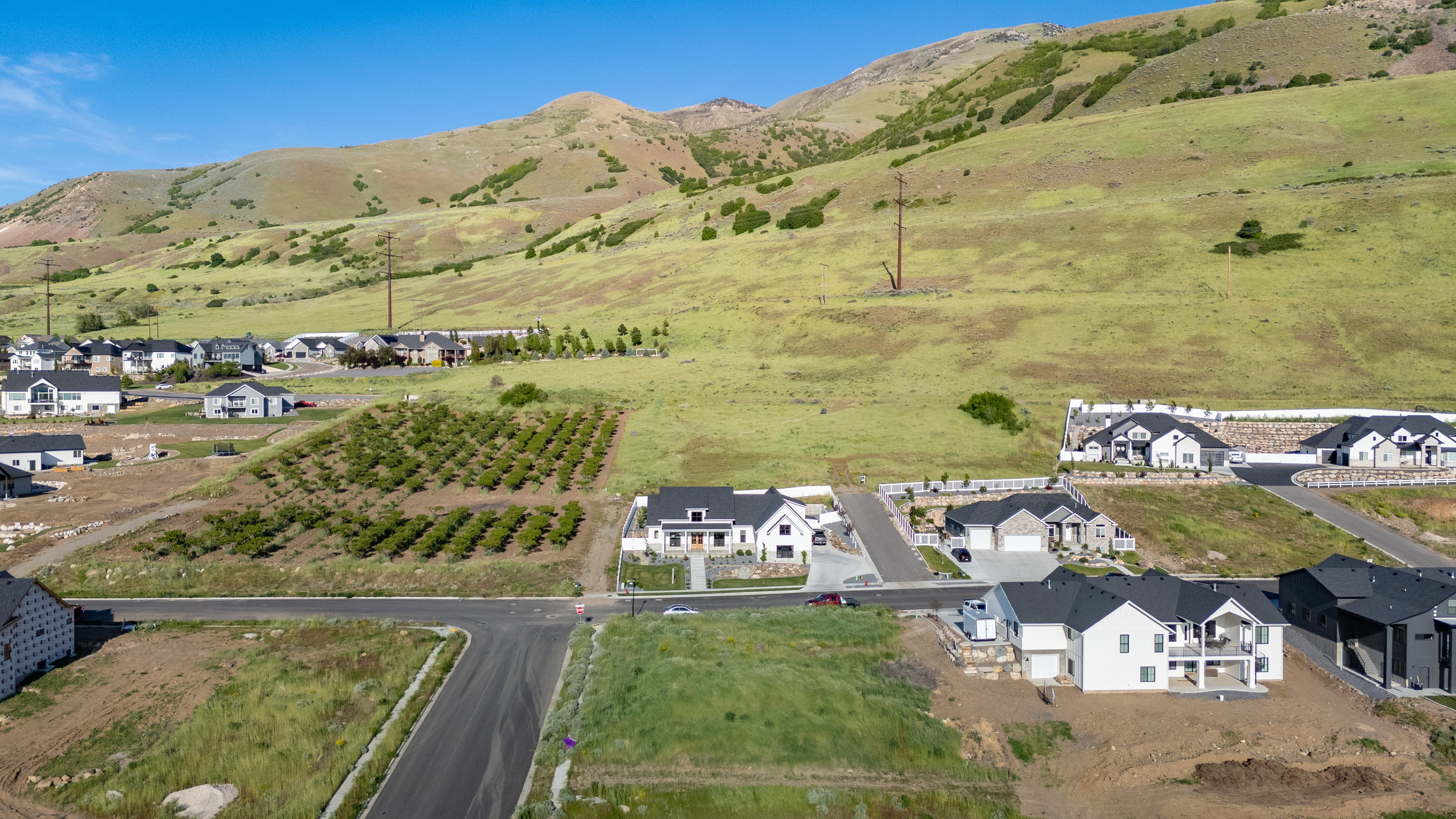 Developing residential area situated against a natural hillside