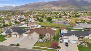 Expansive residential neighborhood featuring single-family homes with mountain backdrops