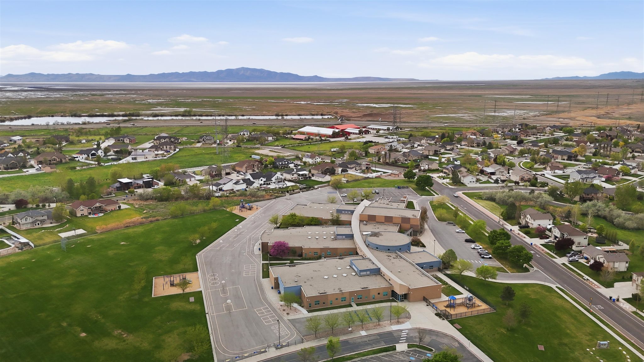 Aerial perspective showcasing residential properties amidst expansive green spaces