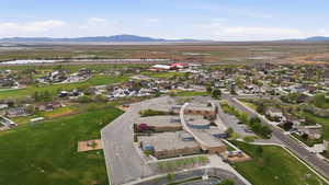 Aerial perspective showcasing residential properties amidst expansive green spaces
