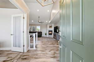 Entryway featuring wood-finish flooring extending into the main living space
