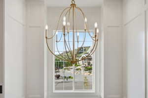 Custom bronze finish chandelier with candelabra-style bulbs