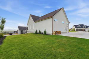 Expansive, fully landscaped backyard with RV parking