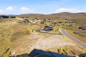 Expansive undeveloped lot presenting opportunities for new construction