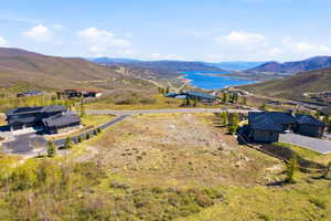 Expansive undeveloped land parcel surrounded by established contemporary residences