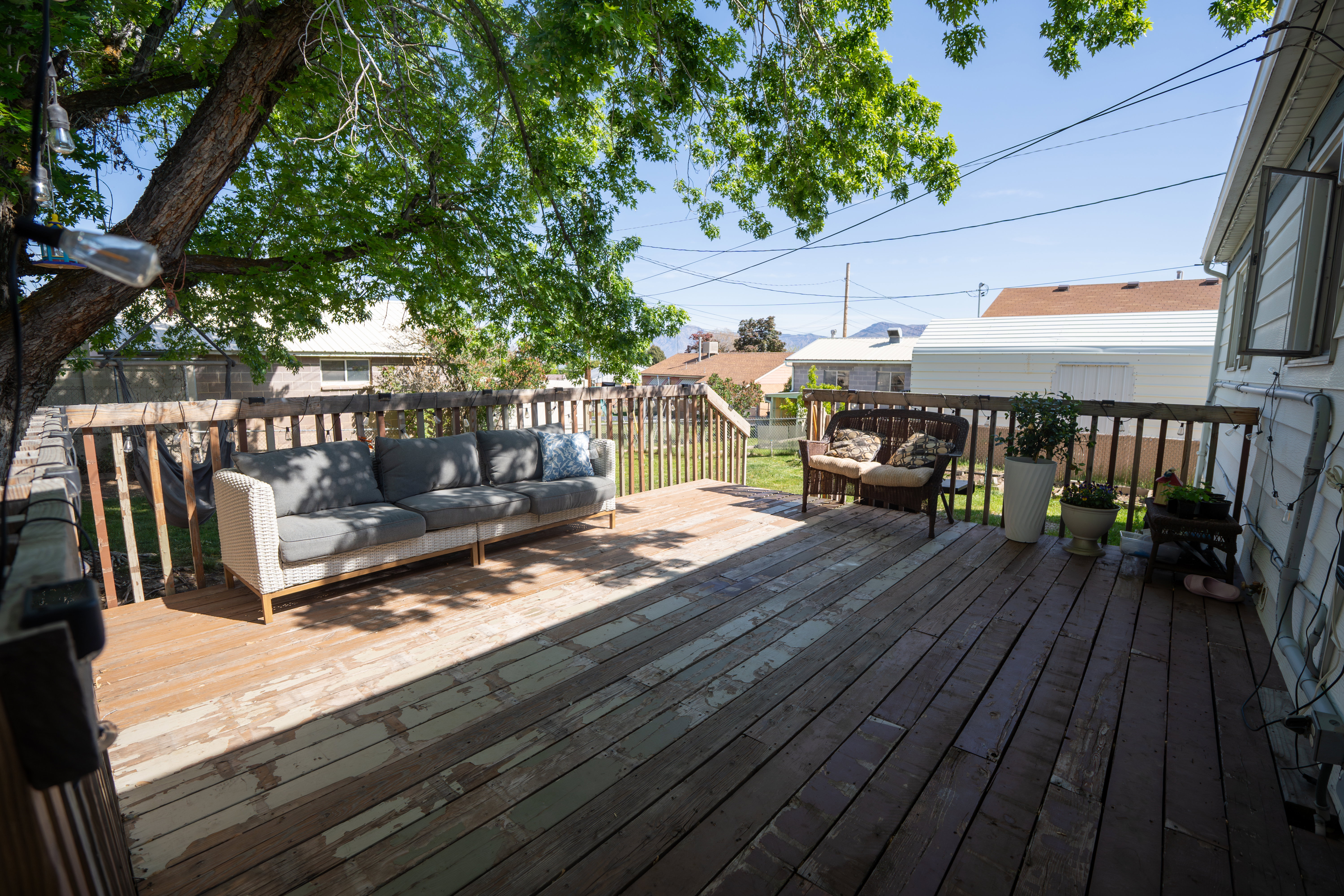Wood deck with a partial privacy fence