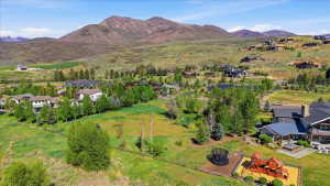Expansive mountain landscape with scattered residential properties
