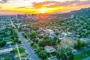 Urban landscape featuring a prominent downtown skyline and surrounding residential areas