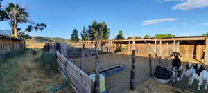 View of yard featuring an outdoor structure and a view of countryside