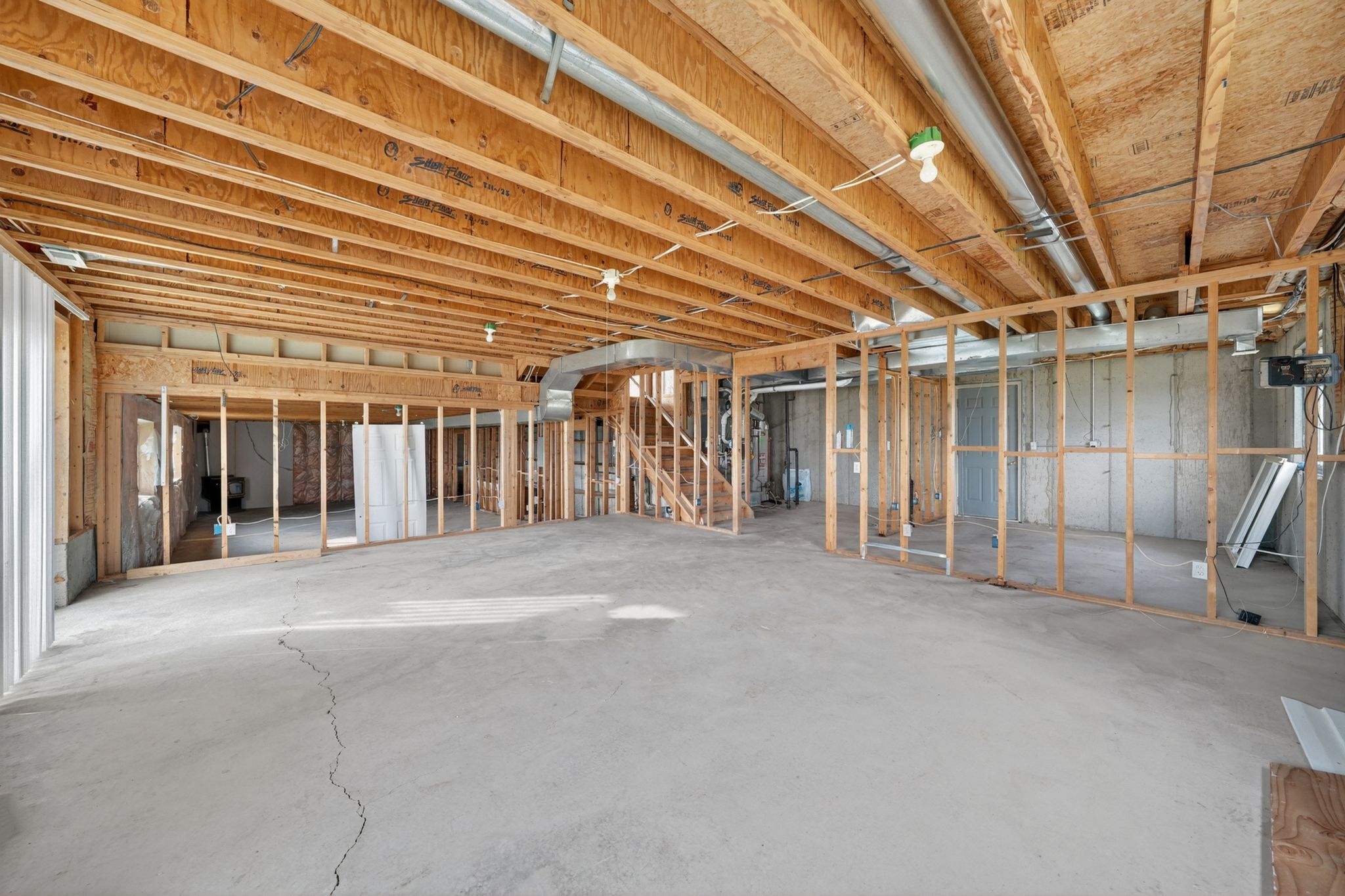 Spacious unfinished basement offering extensive customization potential
