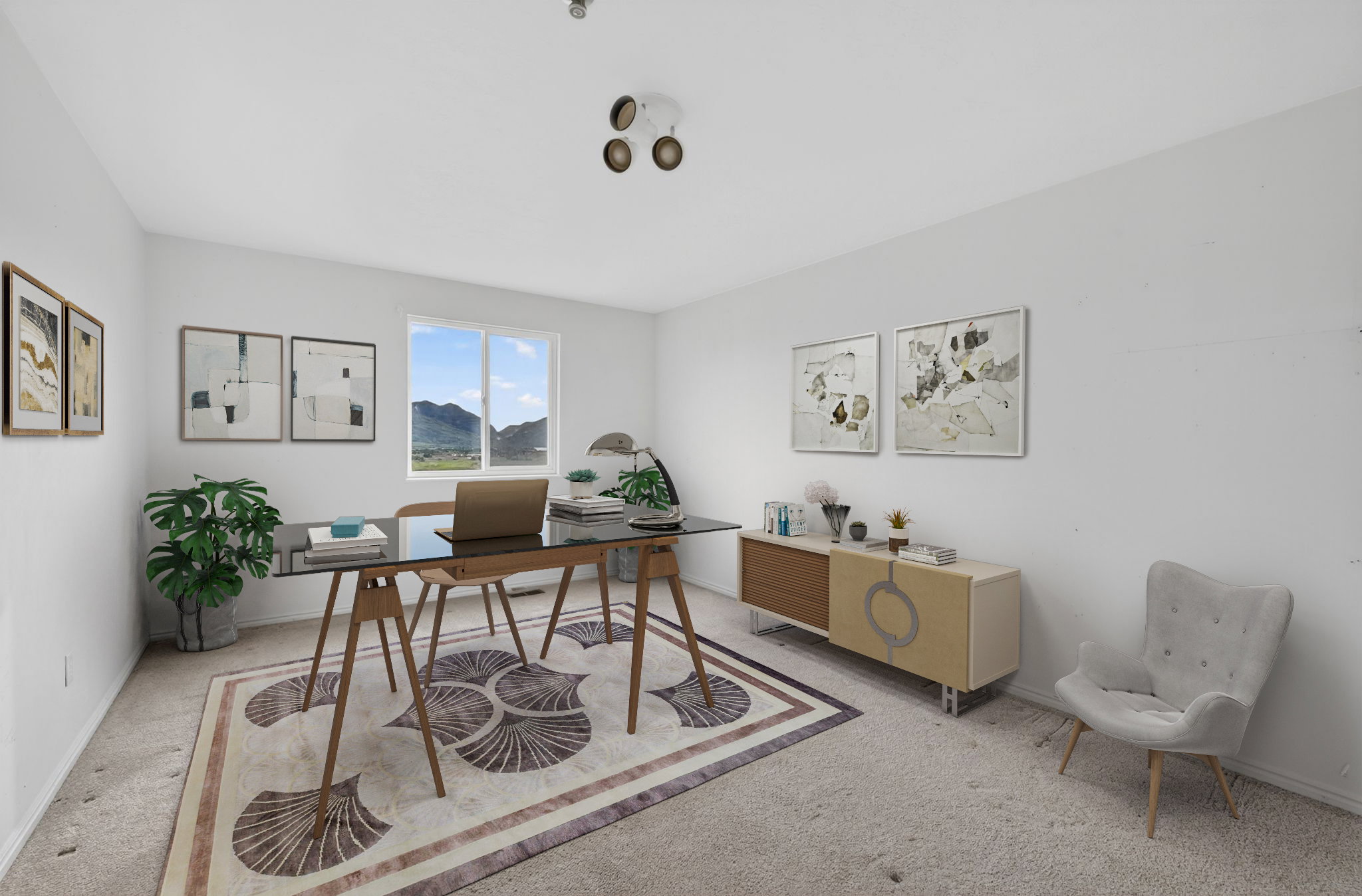Bright interior space featuring a window with mountain scenery, white walls, and a multi-directional ceiling light fixture