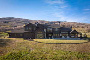 Modern architecture featuring dark exterior siding and multiple rooflines