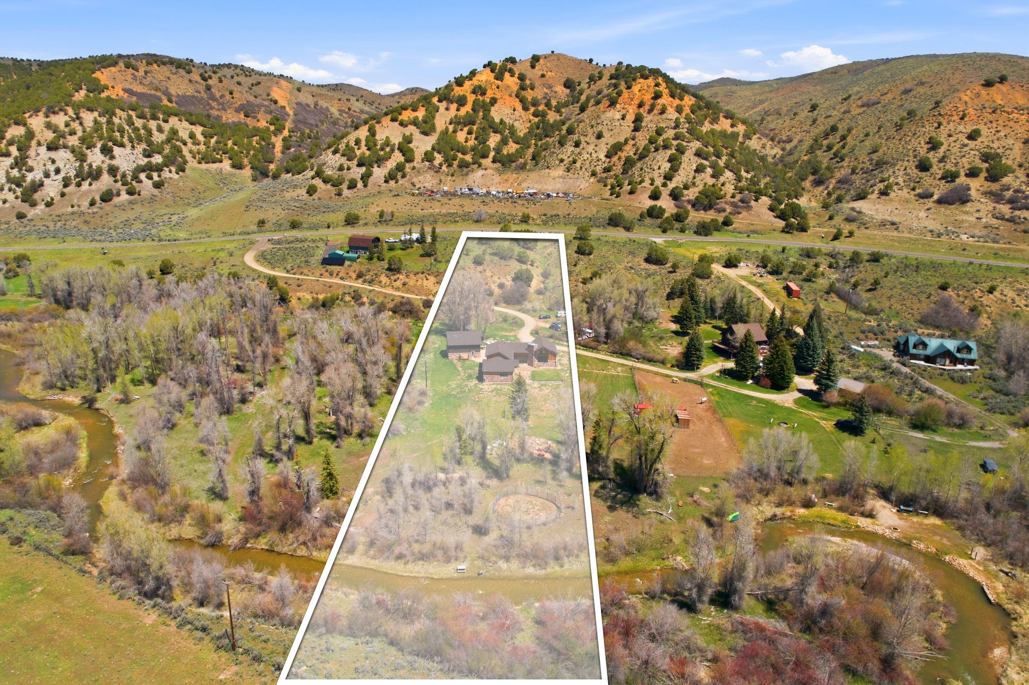 Expansive property featuring a winding river, mature trees, and mountainous terrain
