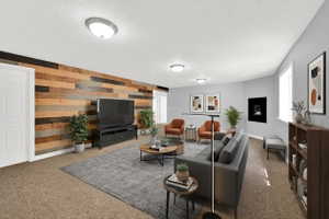 Spacious room featuring a multi-toned wood plank accent wall, wall-mounted electric fireplace, recessed lighting, and durable carpet flooring