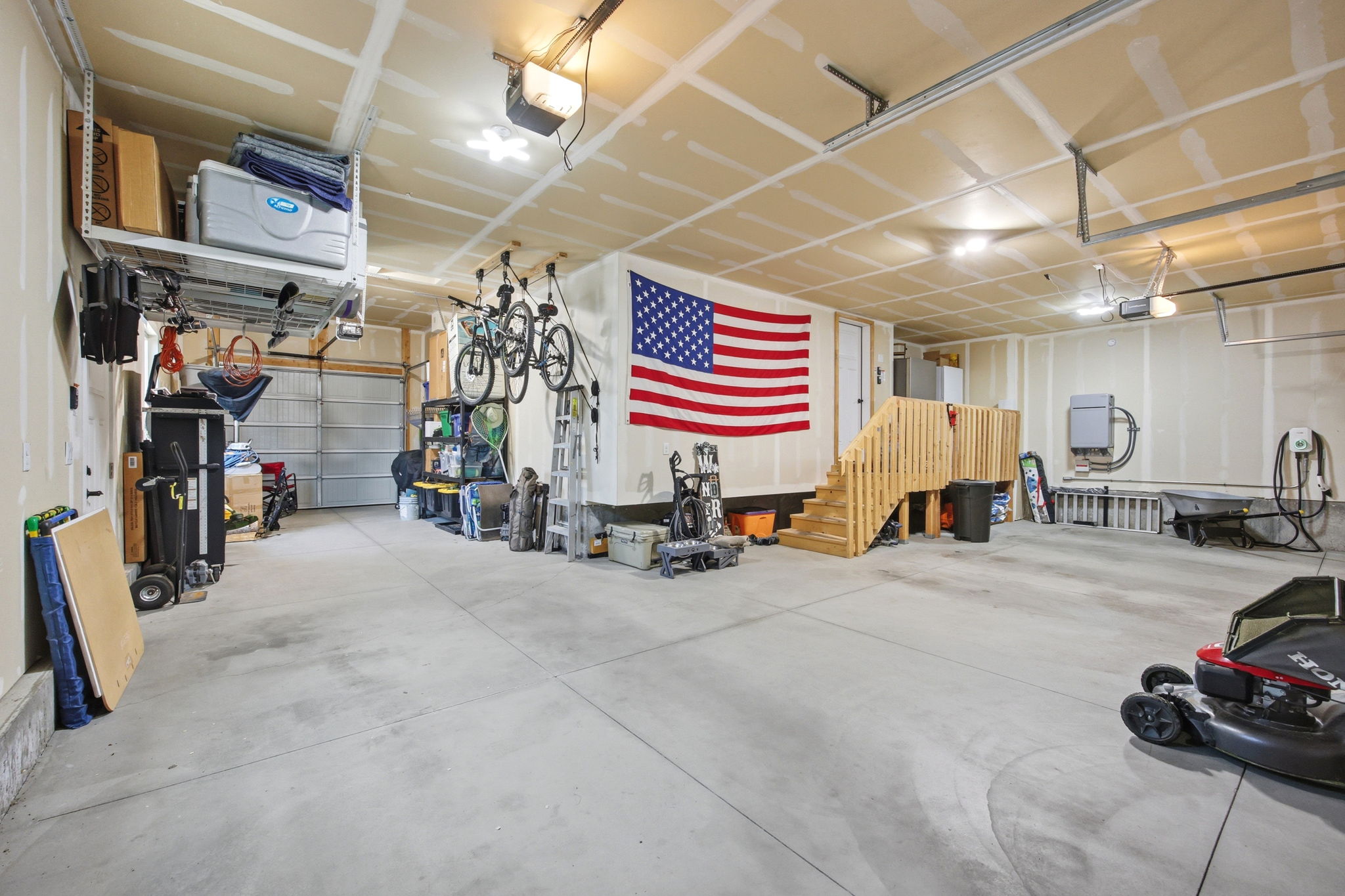 3rd car garage goes all the way back so you can fit 2 cars with a 3 Garage door opener to the back of the home
