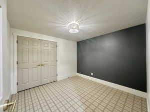 Textured wall-to-wall carpeting with a geometric pattern