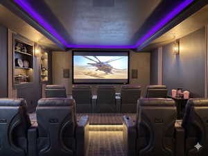 Dedicated home theater featuring a large projection screen, recessed lighting with purple accent strips, and wall-mounted sconces