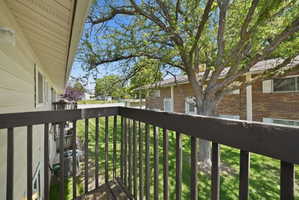 Private balcony with wood railing
