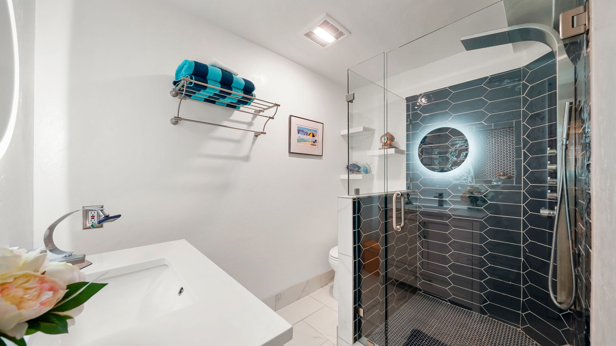 Guest bathroom in basement with rainfall shower