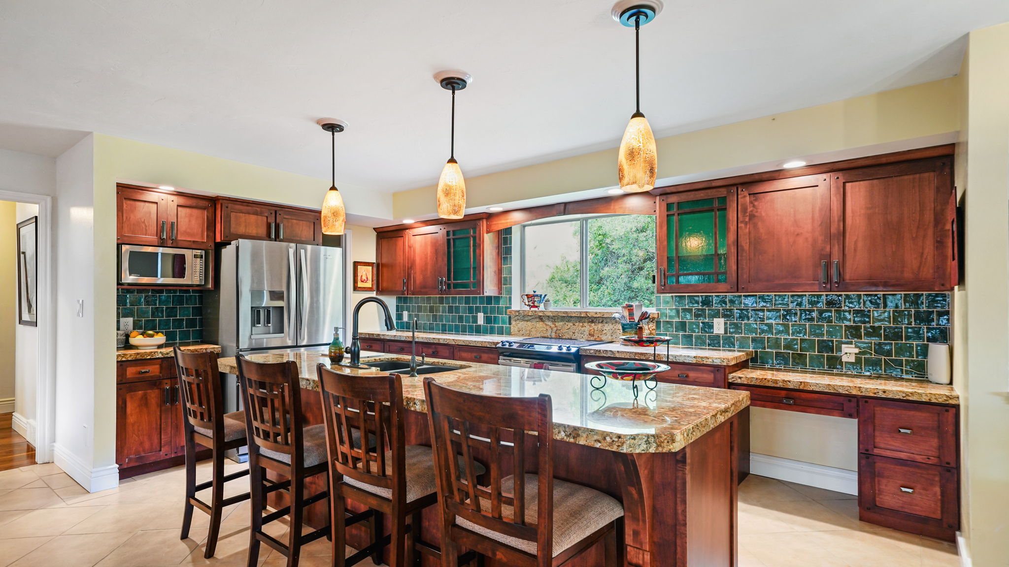 Beautiful Kitchen granite counters and Spanish tile