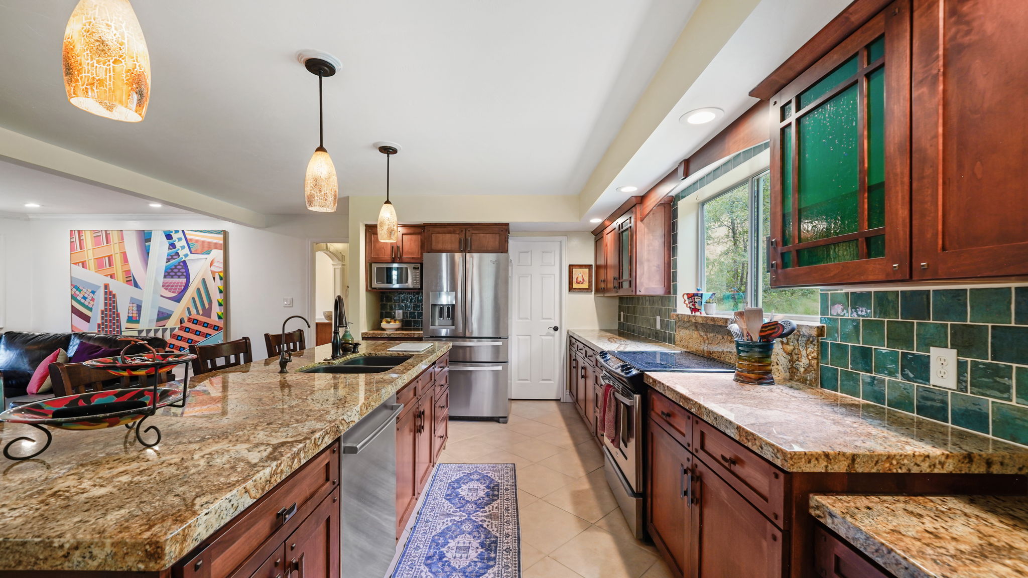 Beautiful Kitchen granite counters and Spanish tile