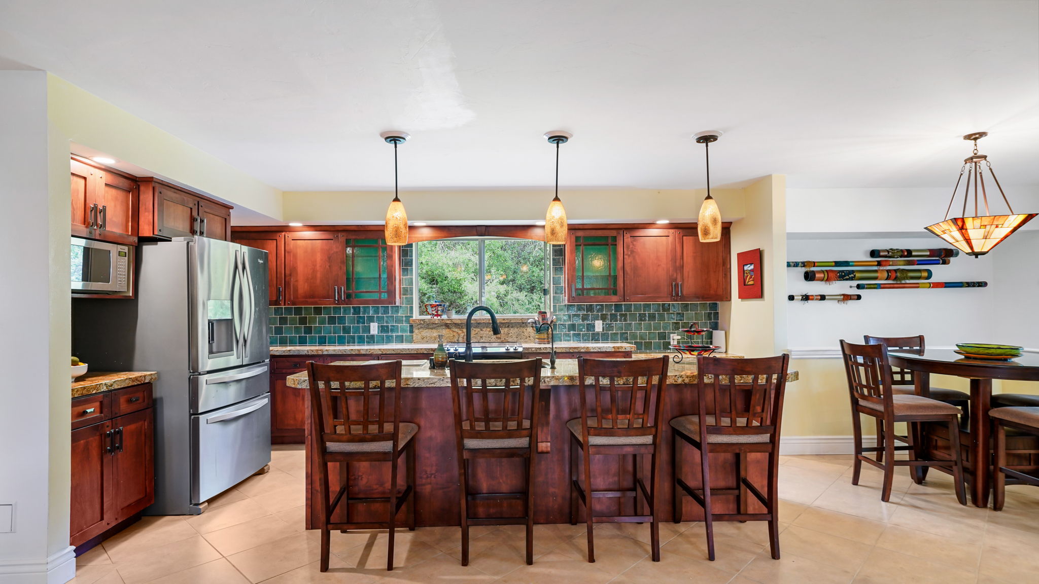 Beautiful Kitchen granite counters and Spanish tile