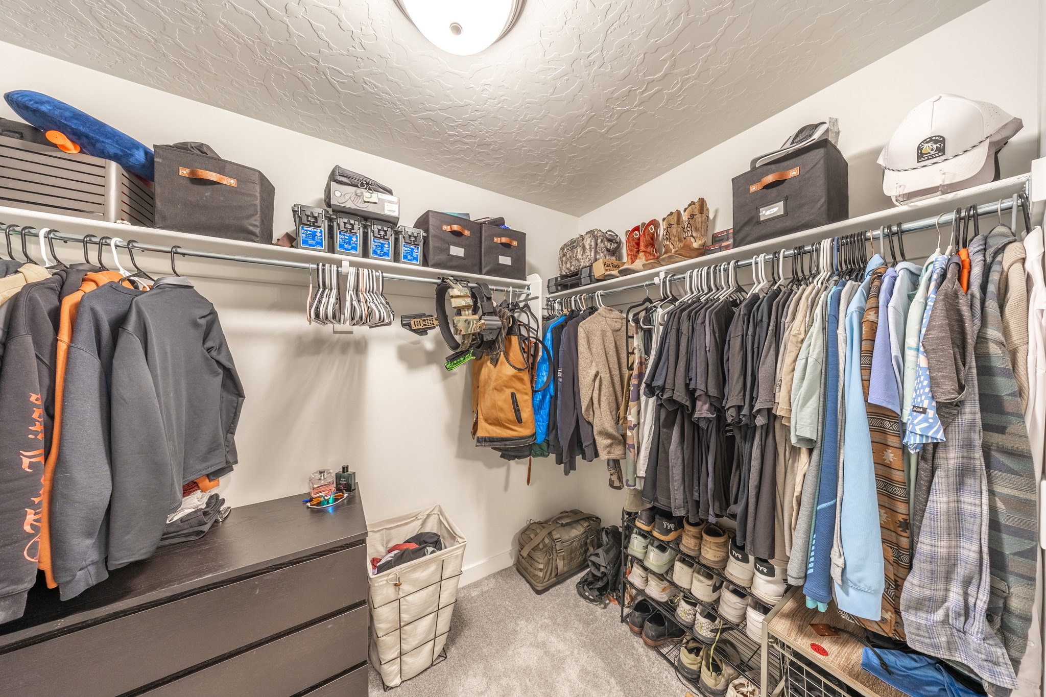 Primary bedroom walk in closet
