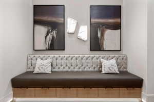 Built-in bench seating with tufted upholstery and under-bench storage drawers