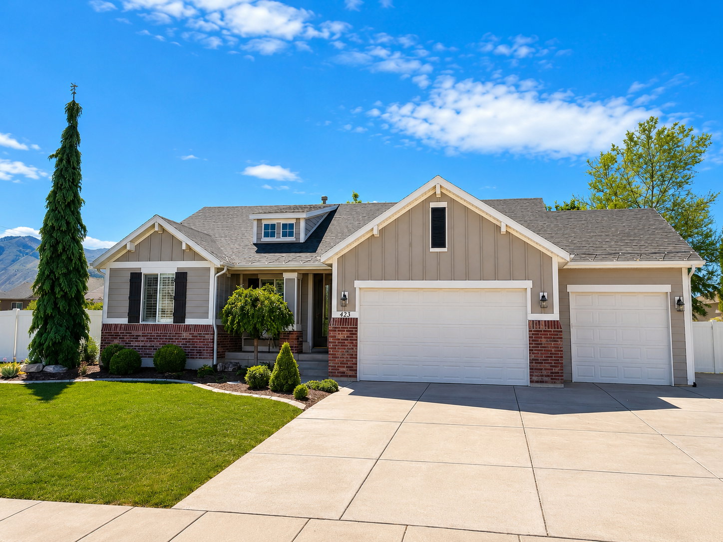 Ranch-style exterior with a partial brick facade and horizontal siding