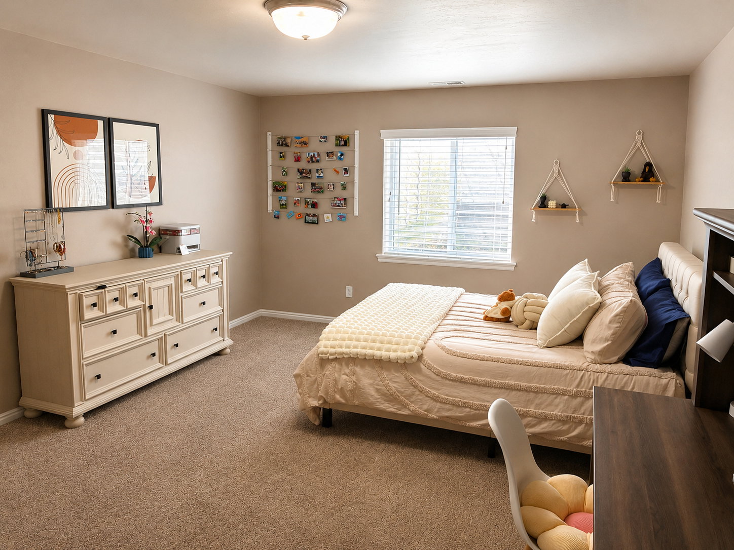 Carpeted room with a ceiling light fixture, a window with blinds, and light neutral wall paint