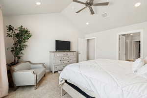 High ceilings with recessed lighting and a ceiling fan