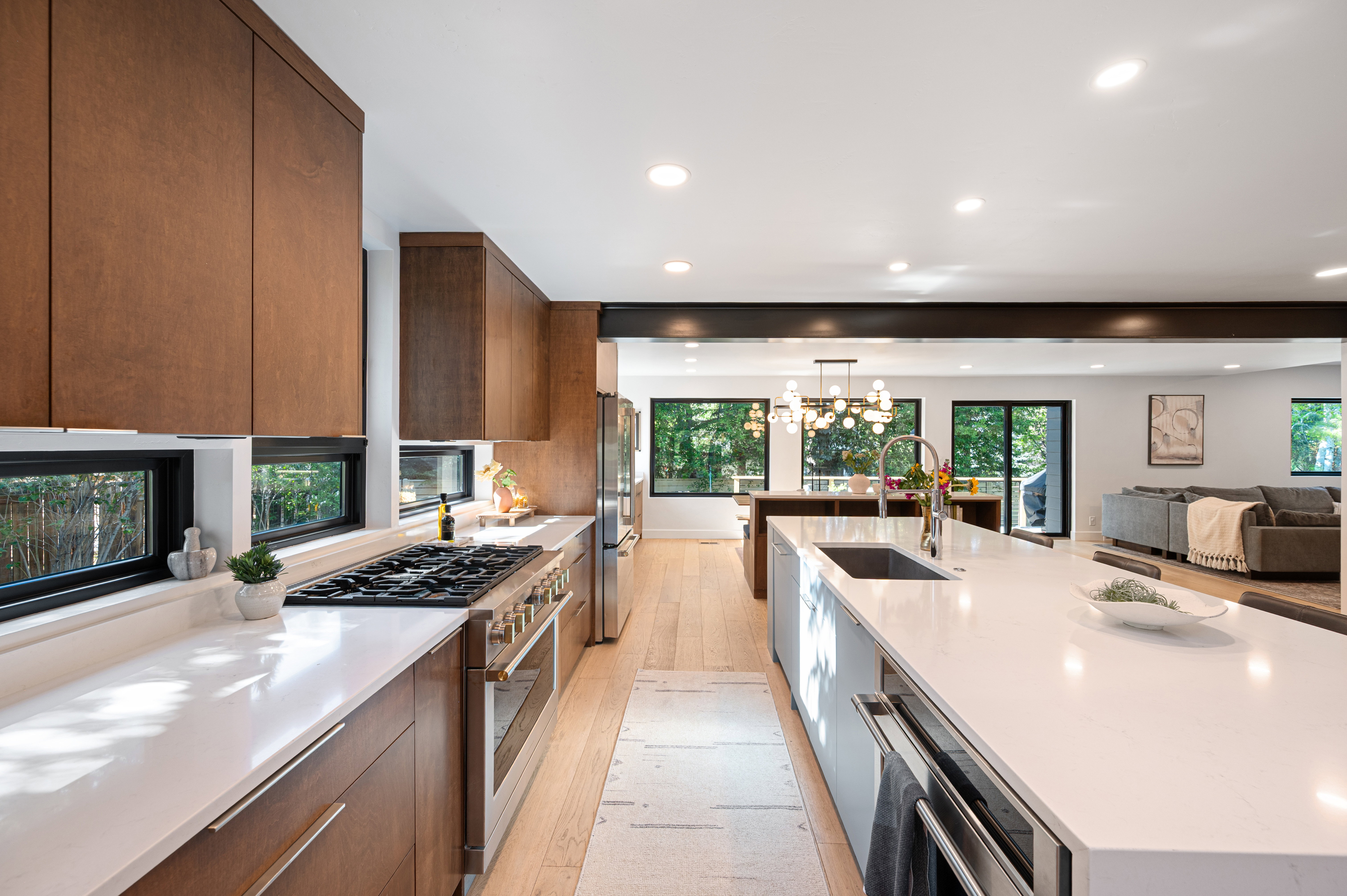 Open-concept kitchen featuring extensive counter space and wood-finish cabinetry